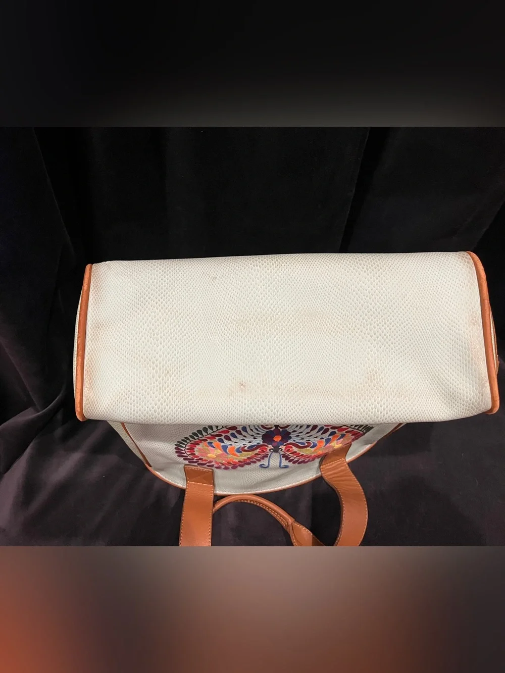 White Consuela Canvas Tote with Colorful Butterfly Embroidery and Tan Trim.